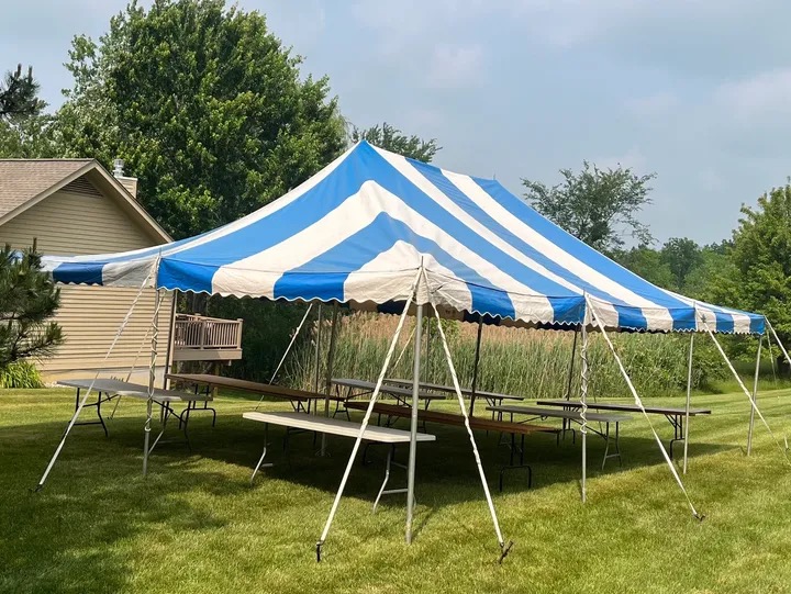 20x30 blue and white striped party tent rental in Grand Blanc MI